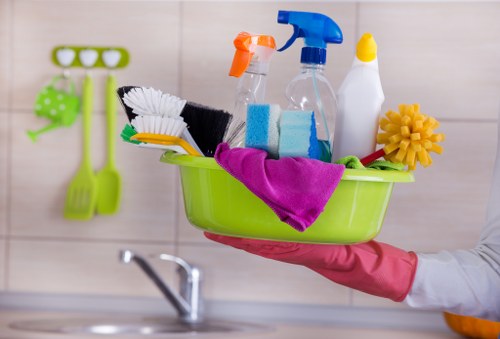 Carpet cleaning team using safe work practices during a professional cleaning task